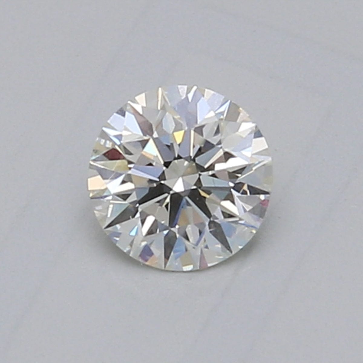 0.60 Carat J VS1 Round Diamond