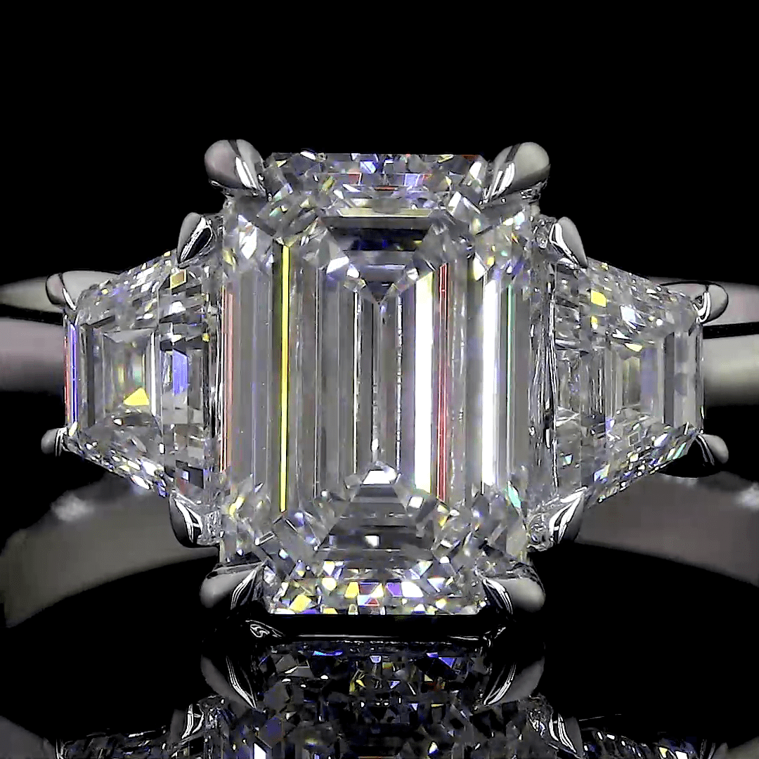 6.9 Carat Emerald Lab Grown Diamond Three-Stone Ring