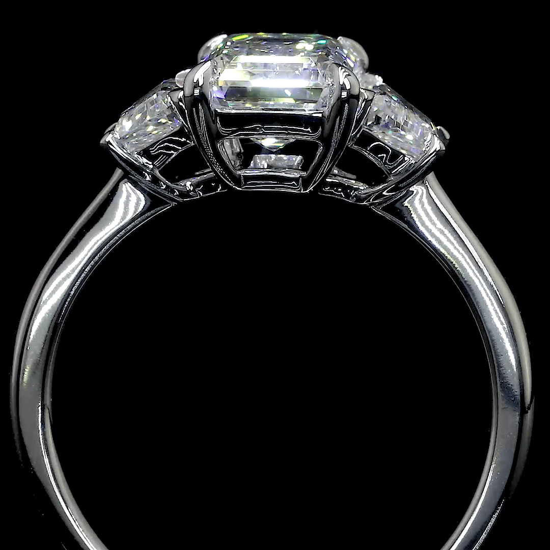 6.9 Carat Emerald Lab Grown Diamond Three-Stone Ring