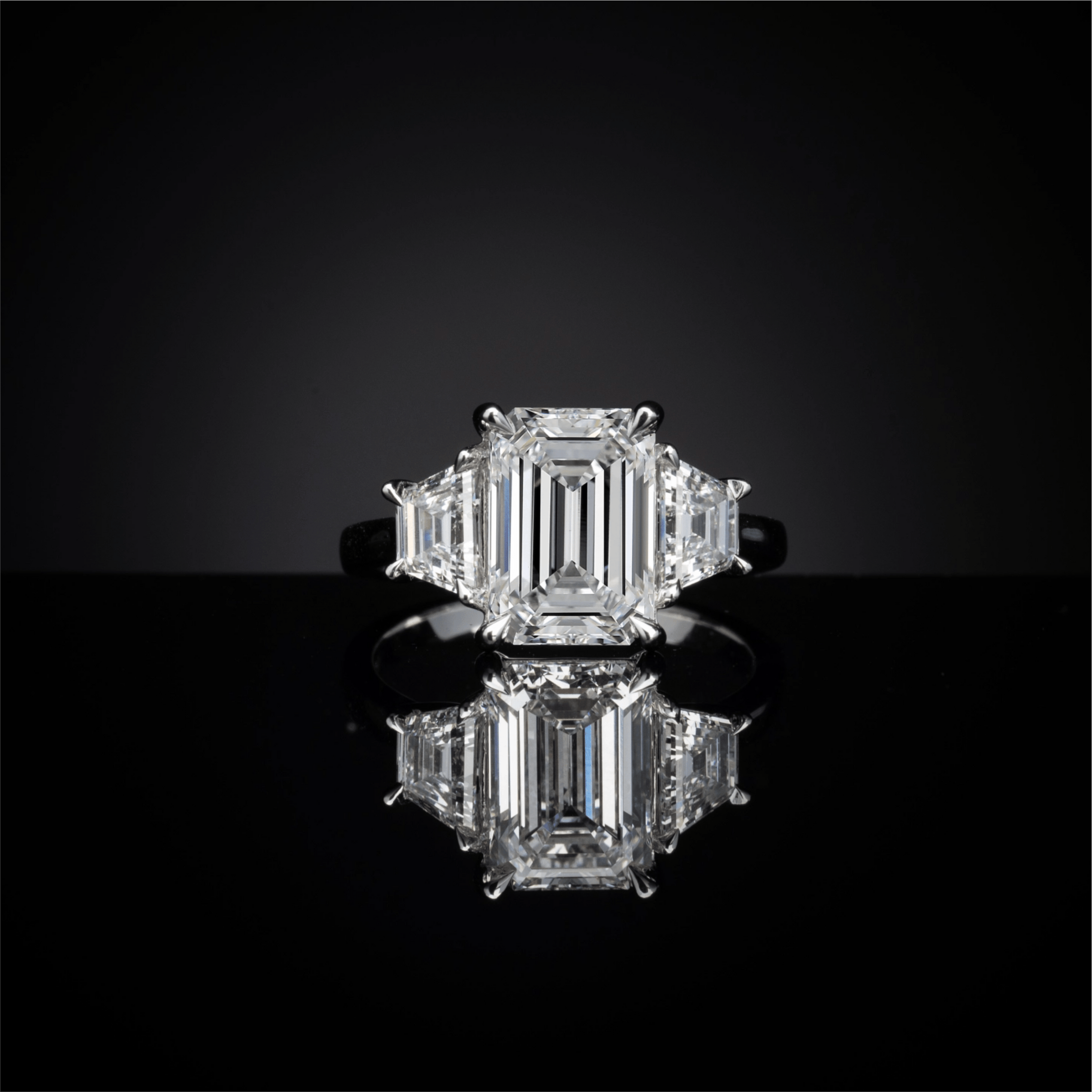 6.9 Carat Emerald Lab Grown Diamond Three-Stone Ring