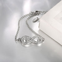 Infinity Pendant Bracelet with Swarovski Elements in 18K White Gold