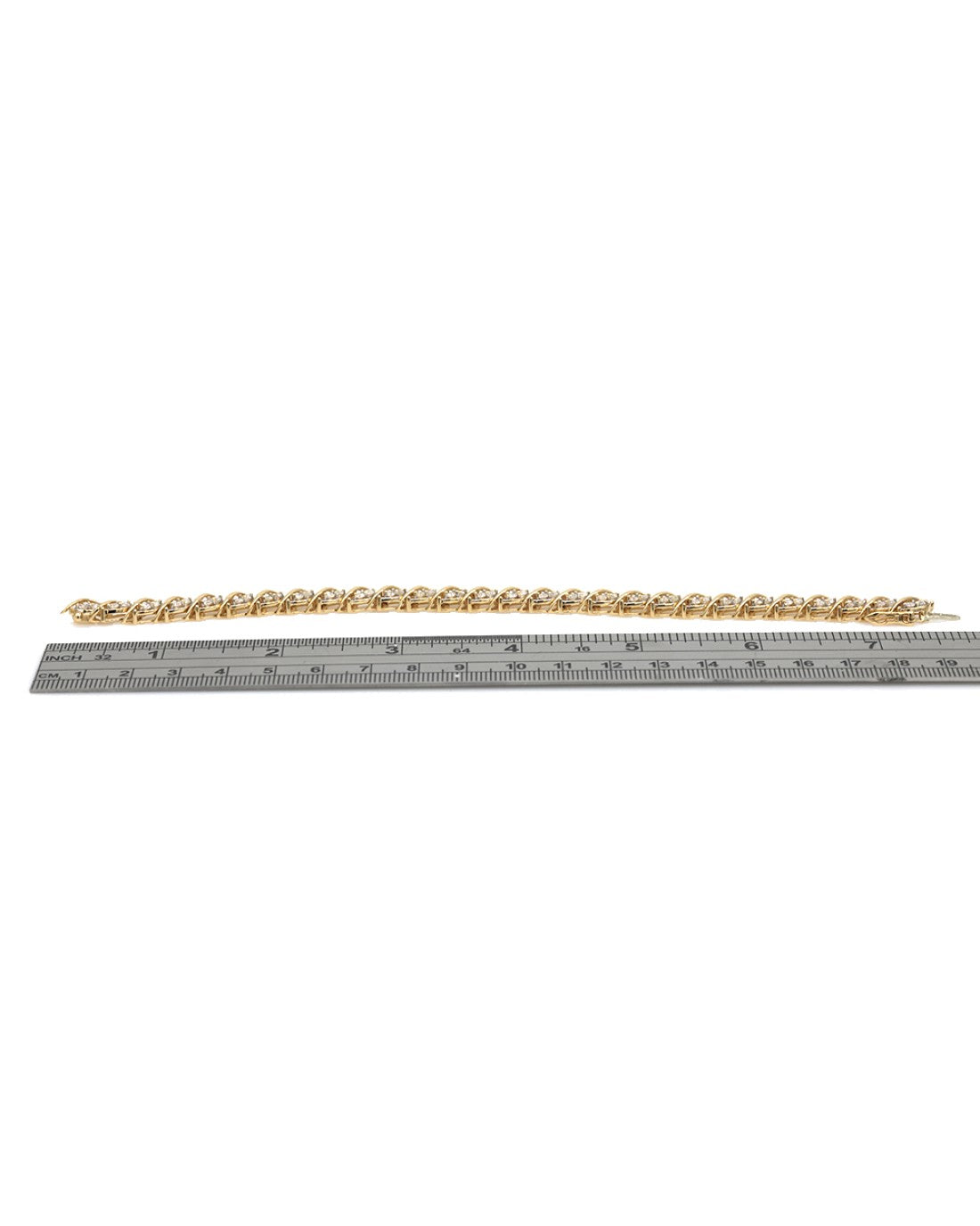 Diamond S Curve Marquise Station Inline Bracelet in White and Yellow Gold