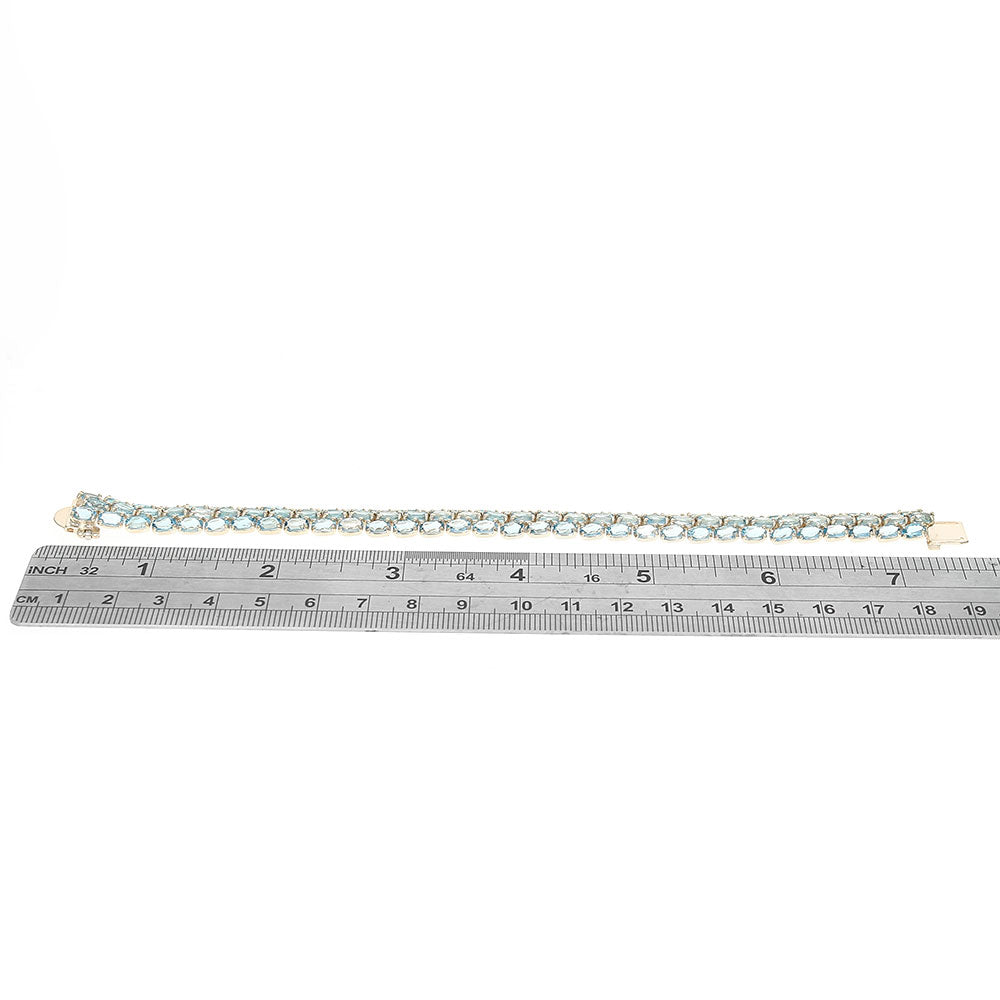 Sky Blue Topaz 3 Row Bracelet in Yellow Gold