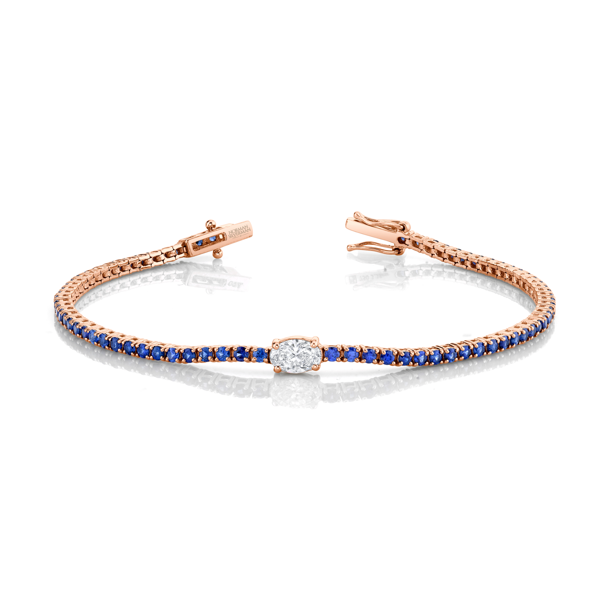 Straight Line Sapphire Bracelet with Oval Diamond Center