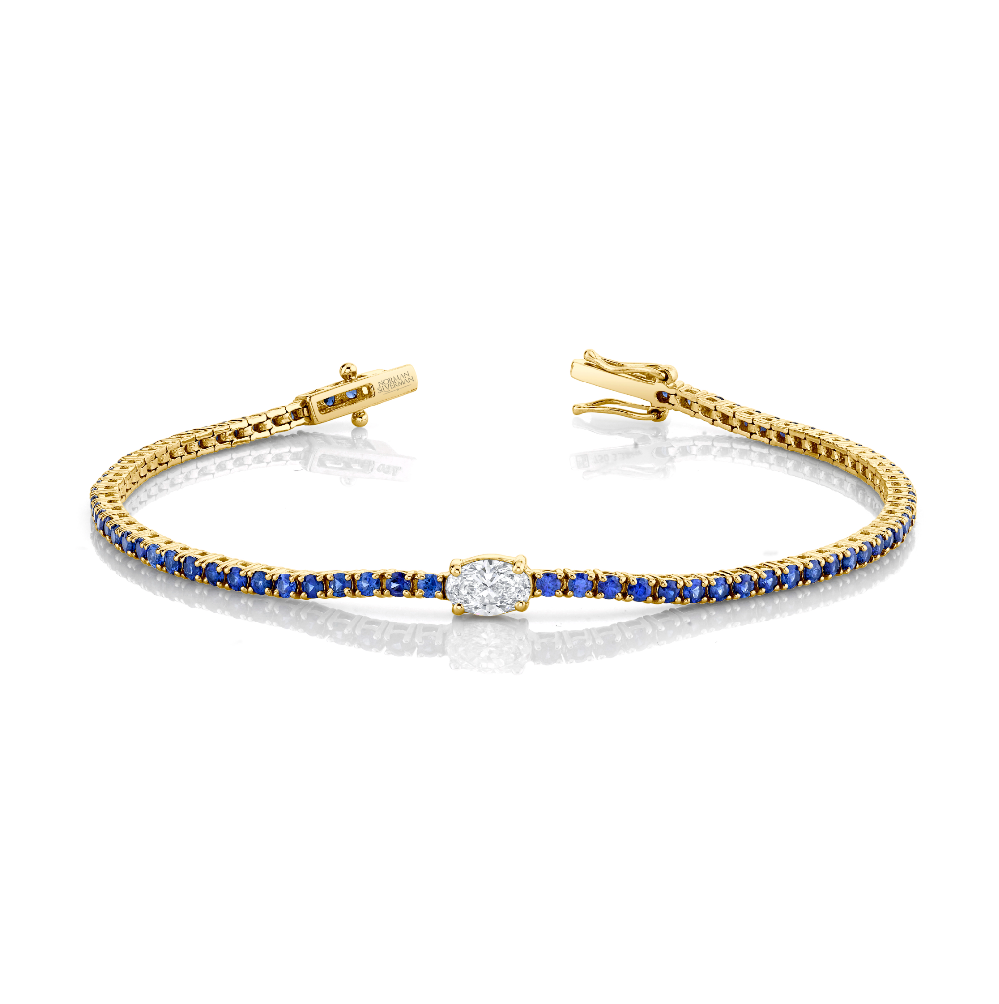 Straight Line Sapphire Bracelet with Oval Diamond Center