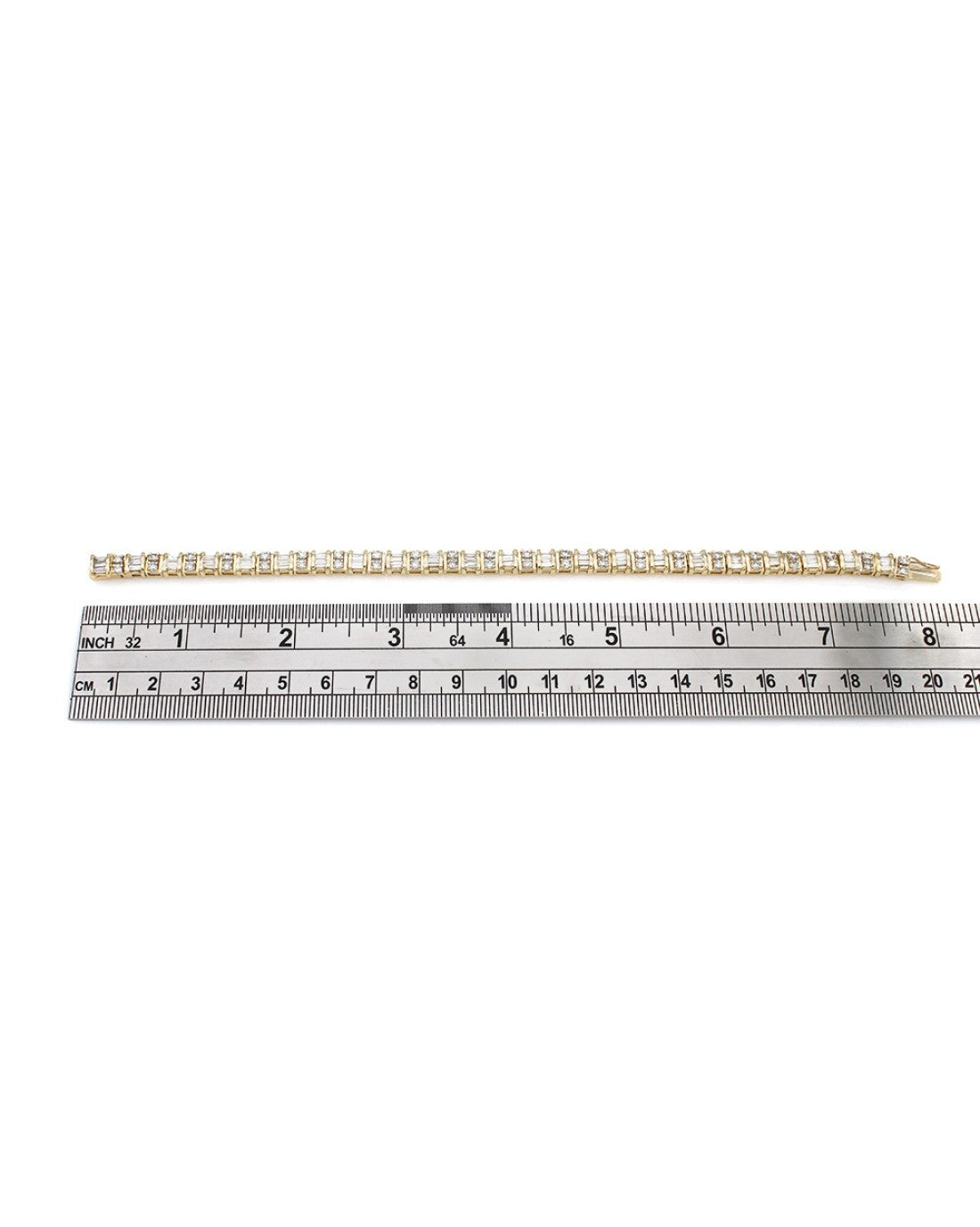 Round and Baguette Diamond Inline Bracelet in Yellow Gold