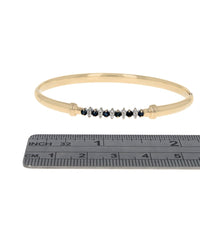 Alternating Blue Sapphire and Diamond Hollow Hinged Bangle Bracelet in Yellow Gold