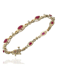 Alternating Ruby and Diamond Crossover Link Bracelet in Yellow Gold