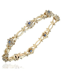 Diamond and Blue Sapphire Crossover Flower Link Bracelet in White Gold