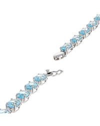 Alternating Sky Blue Topaz and Diamond Inline Bracelet in White Gold