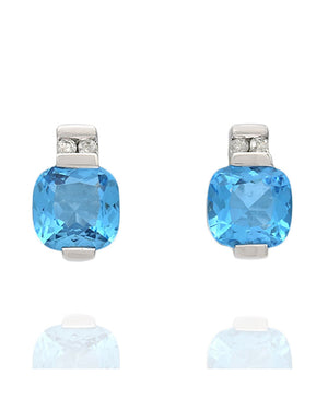 Blue Topaz and Diamond Accent Stud Earrings