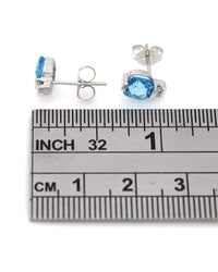 Blue Topaz and Diamond Accent Stud Earrings