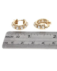 Pearl Huggie Earrings in Yellow Gold