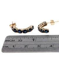 Blue Sapphire Half Hoop Earrings in Yellow Gold