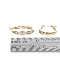 Diamond Oval Hoop Earrings in Yellow Gold