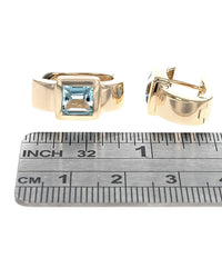 Sky Blue Topaz Curved Hoop Earrings in Yellow Gold