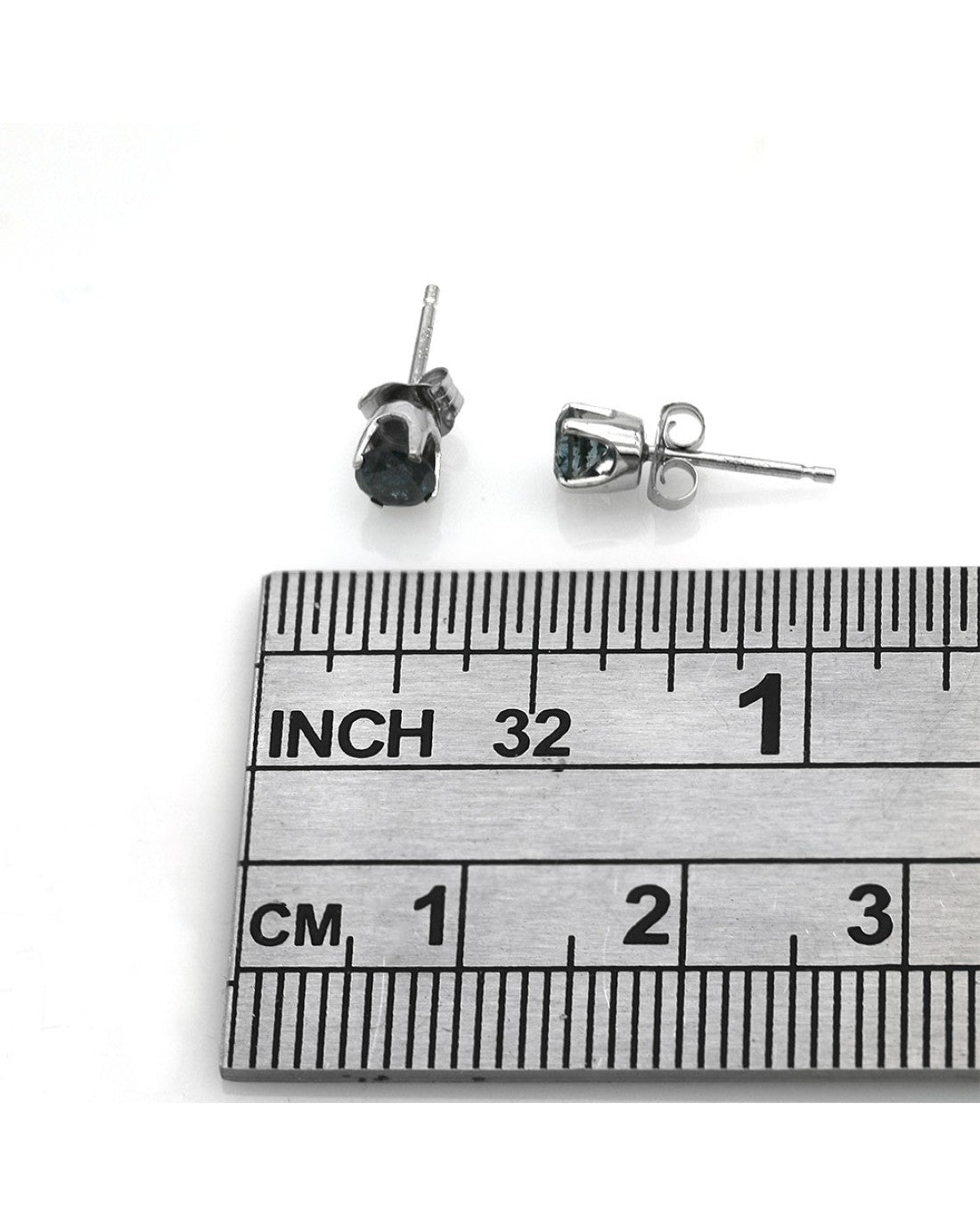 Irradiated Blue Diamond Stud Earrings in White Gold