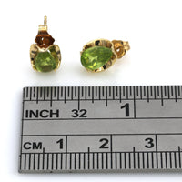 Pear Cut Peridot Stud Earrings in Yellow Gold