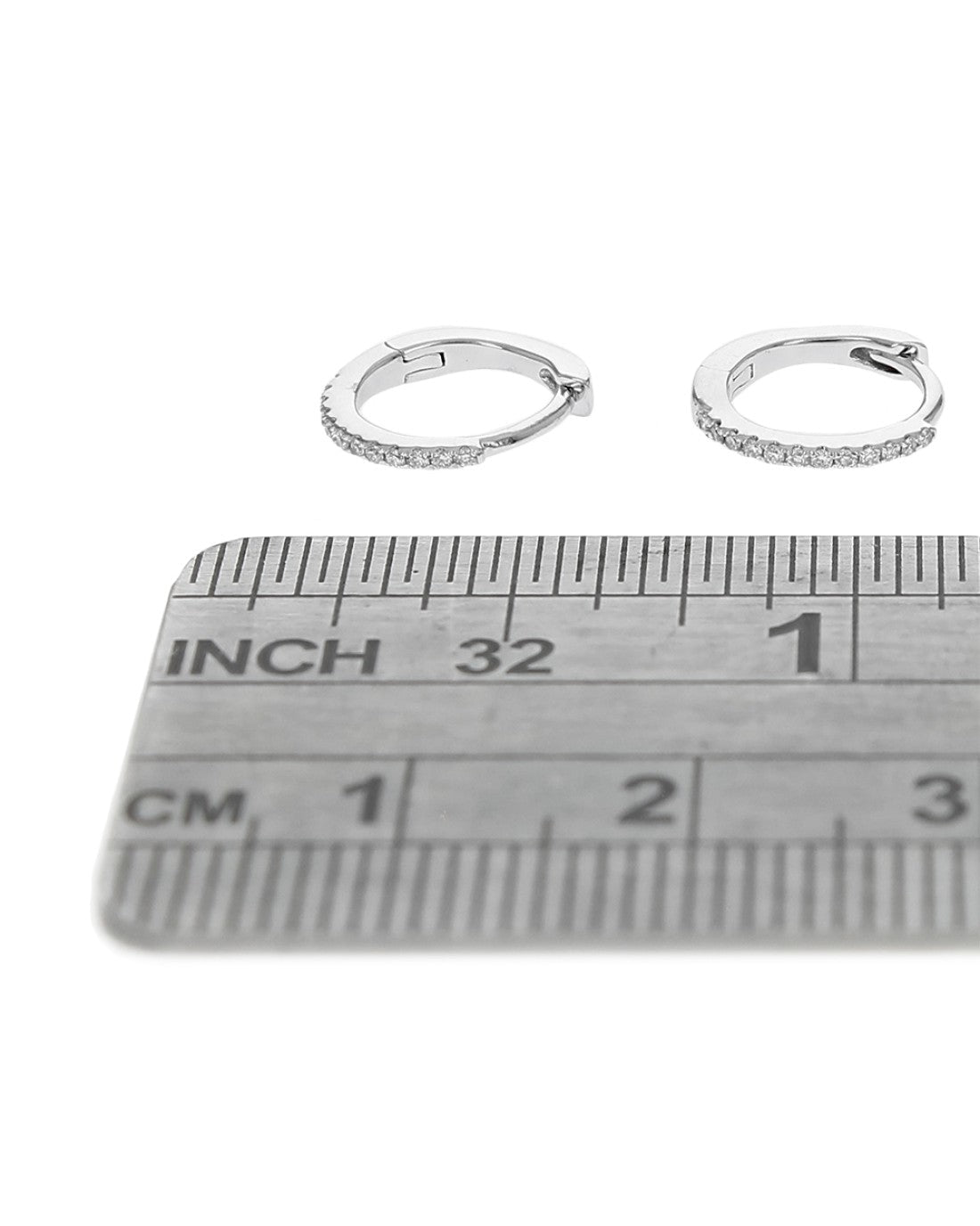 Miniature Diamond Huggie Earrings in Gold