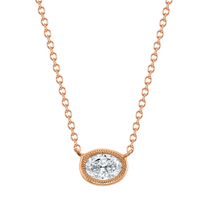 Petite Oval Cut Diamond Yellow Gold Bezel Pendant