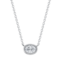 Petite Oval Cut Diamond Yellow Gold Bezel Pendant