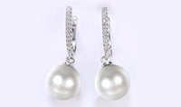 White Swarovski Elements Thin Dangling Freshwater Pearl Clip On Earrings in 18K White Gold Plating
