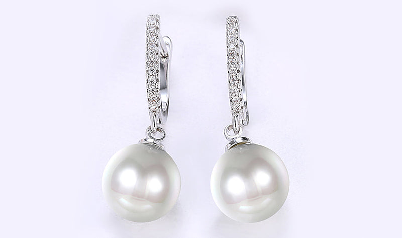 White Swarovski Elements Thin Dangling Freshwater Pearl Clip On Earrings in 18K White Gold Plating