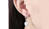 White Swarovski Elements Thin Dangling Freshwater Pearl Clip On Earrings in 18K White Gold Plating