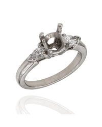 Pear Shape Three Stone Diamond Mounting in Platinum
