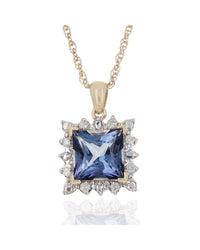 Coated Blue Topaz and Diamond Halo Necklace in White and Yellow Gold
