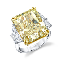 18.88 Carat Radiant Fancy Intense Yellow Diamond 3-stone Ring