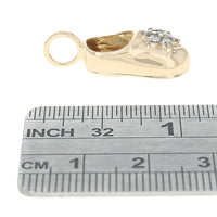 Diamond Flower Baby Shoe Pendant in Yellow Gold