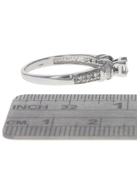 Princess Diamond Solitaire Round and Baguette Diamond Accent Engagement Ring