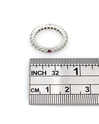 Diamond Eternity Band with Pink Sapphire Solitaire