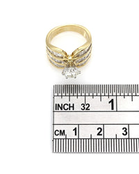 Round and Baguette Diamond Ring in Gold
