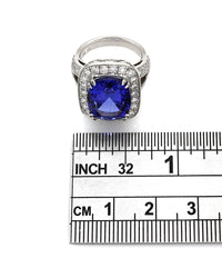 Tanzanite and Diamond Halo Ring in Gold