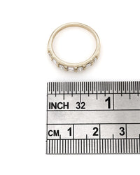 Round and Baguette Diamond Ring in Gold