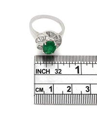 Oval Emerald Ring with Baguette Diamond Channel Swirl in Platinum