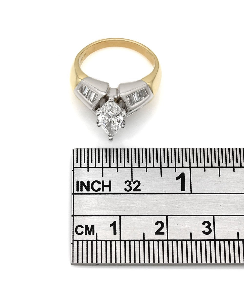 Channel Set Baguette Diamond Ring with 1.17ct Marquise Center Diamond in 18ktt