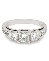 Princess and Round Diamond Three Stone Ring in Platinum