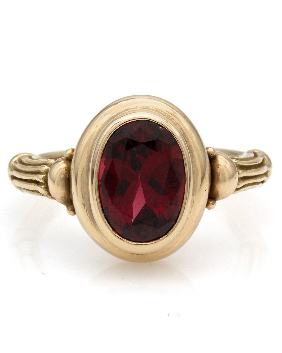 Oval Garnet Ring in Yellow Gold