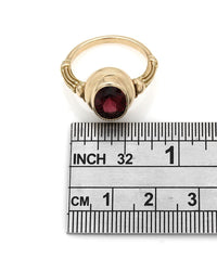 Oval Garnet Ring in Yellow Gold