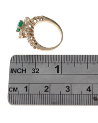 Emerald and Diamond Bypass Ring in Yellow Gold