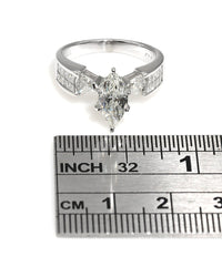 Marquise Diamond Solitaire Engagement Ring with Trilliant and Princess Accents