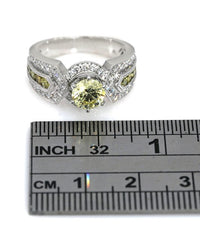 GIA Certified 1.02 Fancy Yellow Round Brilliant Cut Diamond Solitaire Ring in 14KW