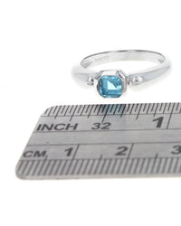 Octagon Shape Blue Topaz Solitaire Ring