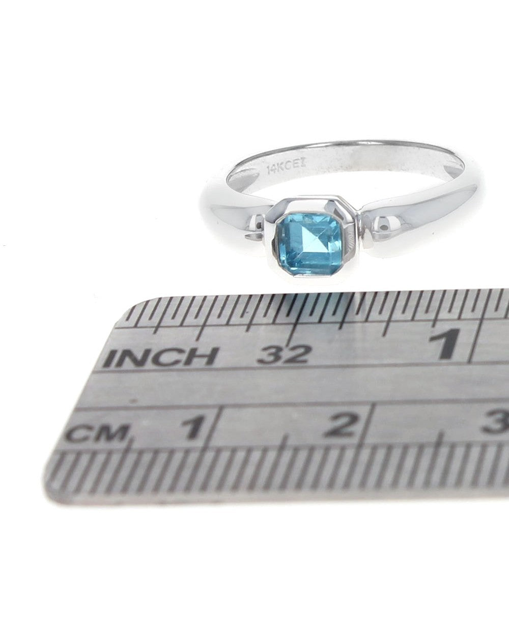 Octagon Shape Blue Topaz Solitaire Ring