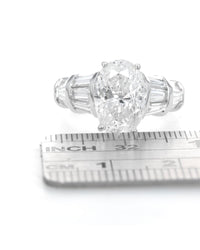 Oval Cut Diamond Solitaire Ring in Platinum