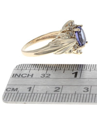 Oval Tanzanite and Round Diamond Fluted Ring
