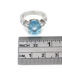 Oval Blue Topaz and Diamond Ring in White Gold